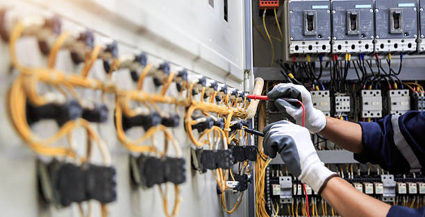 Professional Electrician technician working in Miramar Beach, FL